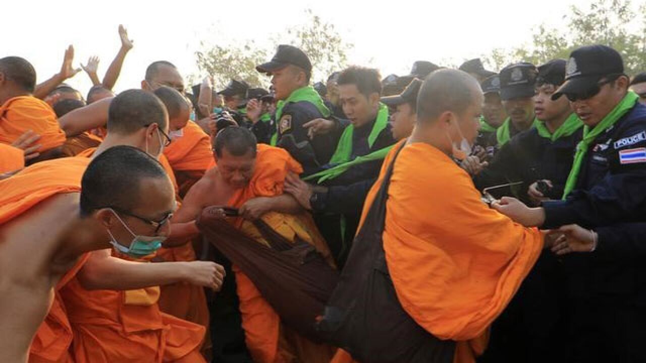 Monks And Police Clash At Buddhist Temple In Thailand During Hunt For