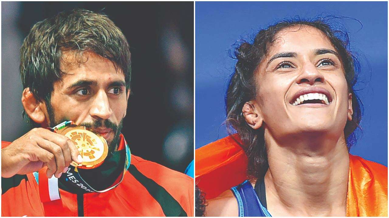 Gold Medal Winning Wrestlers Vinesh Phogat Bajrang Punia In Fray For