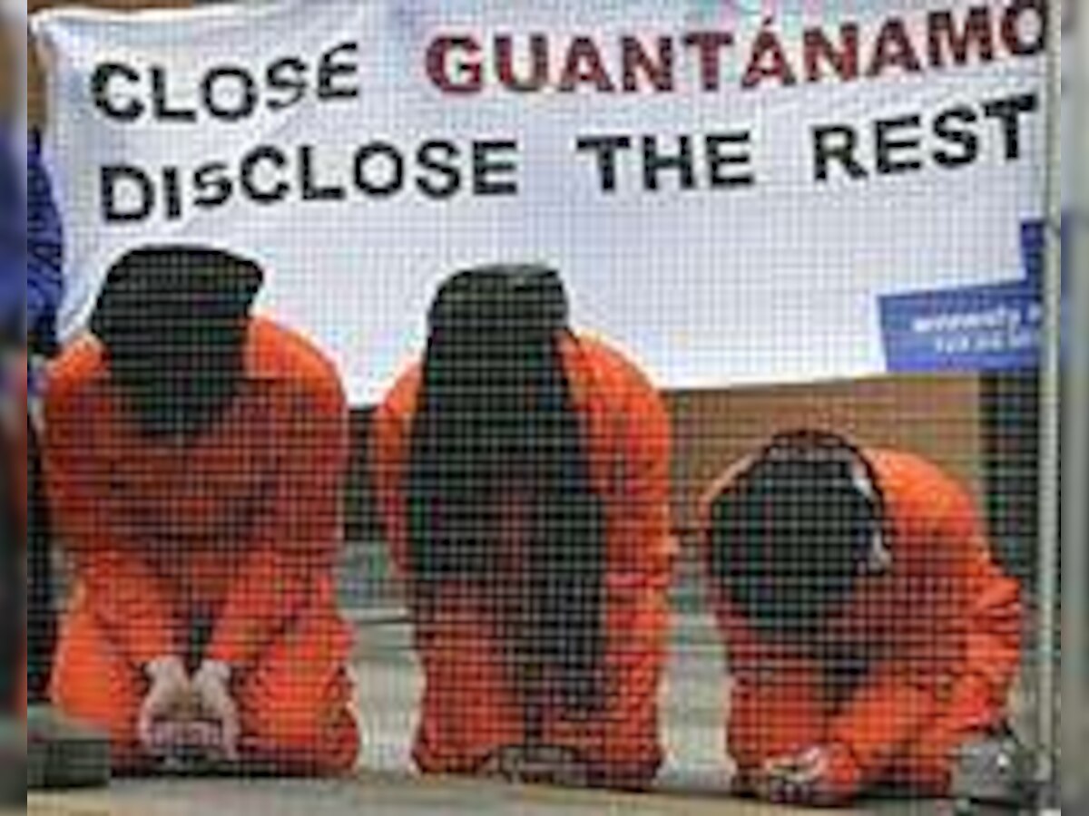 Obama halts prosecutions of Gitmo detainees for 120 days