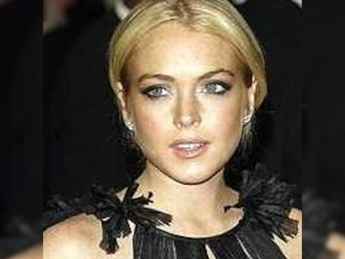 Lohan puts cash in joint account with Ronson