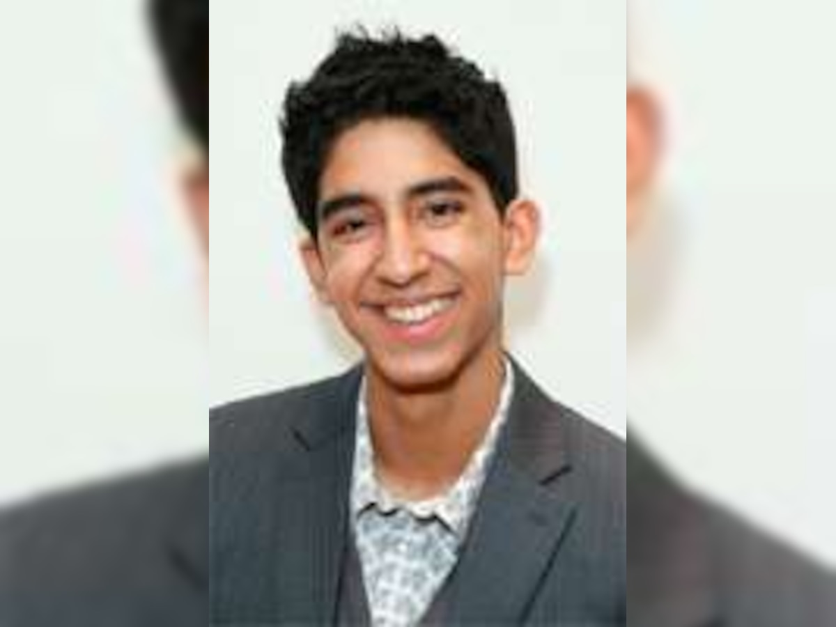 Dev Patel struck by 'how happy people are in the slums'