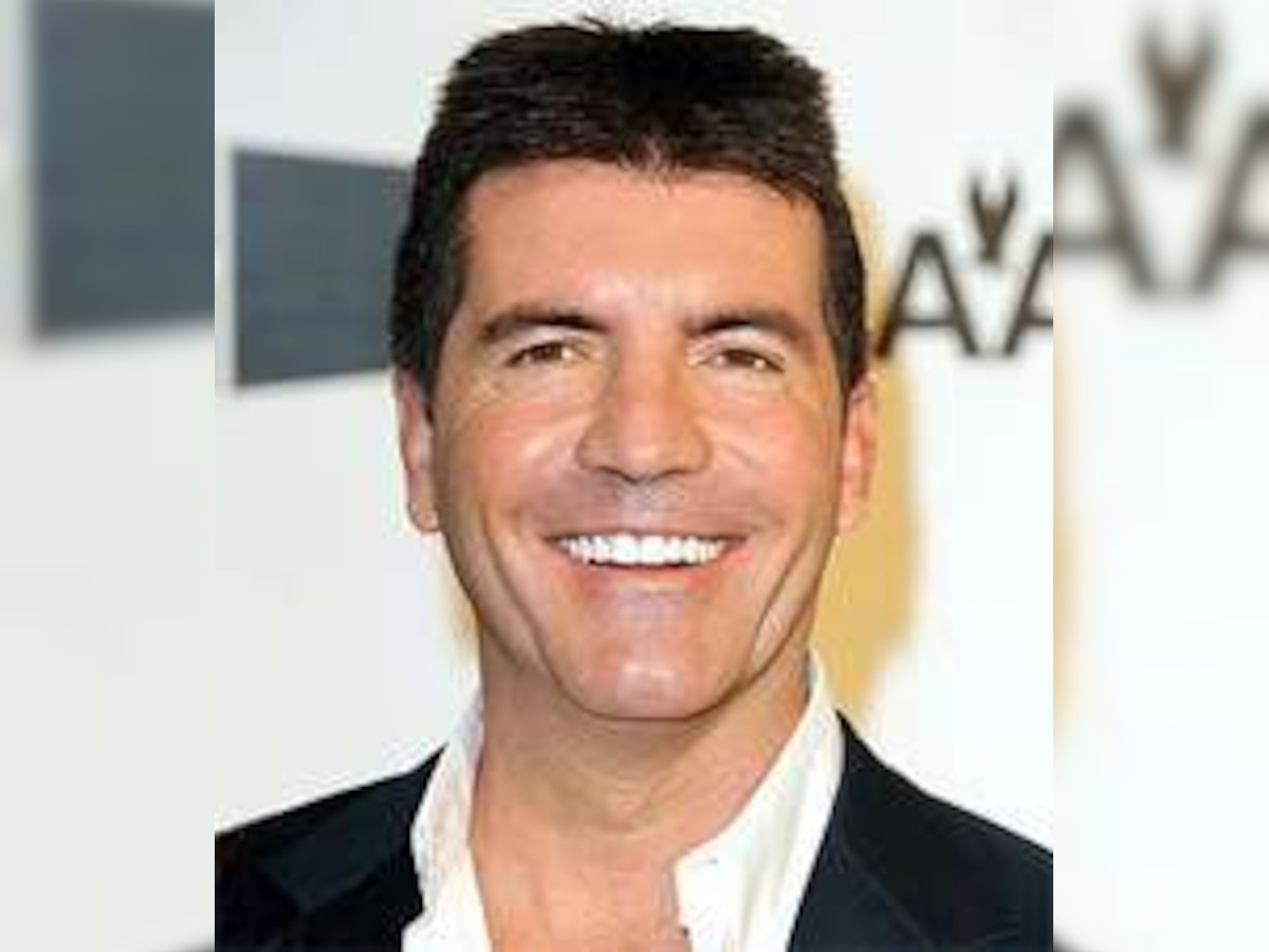 'Busy' Cowell turns down Obama's dinner invite