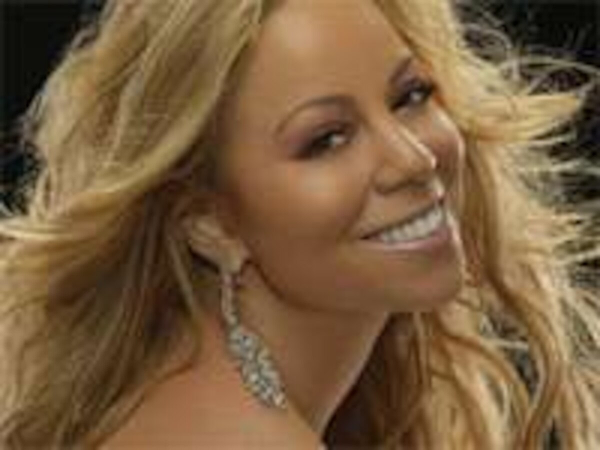 Mariah Carey showered with sparkling diamonds after private gig