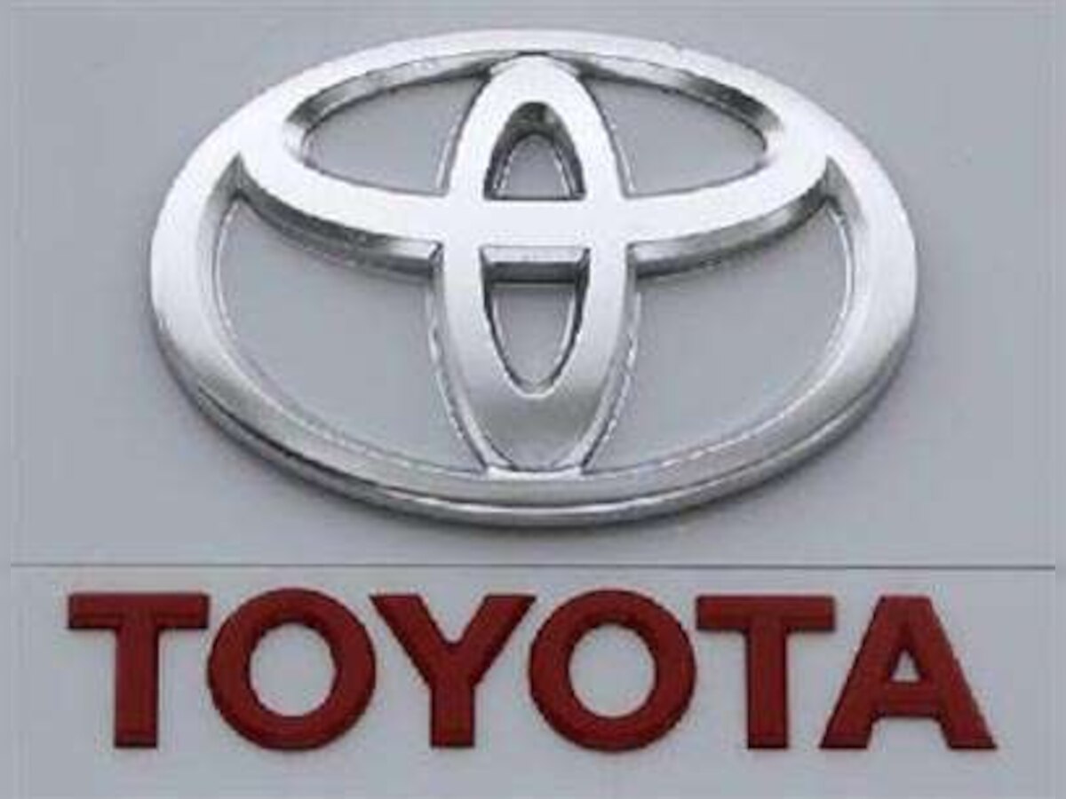 Toyoda slips into China on damage control mission