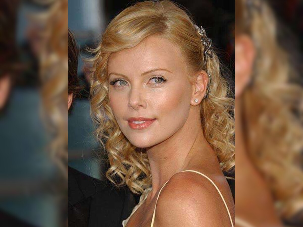 Charlize Theron visits schools across South Africa