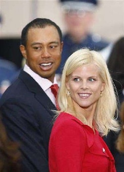 Tiger Woods spotted with wife 'look-alike'