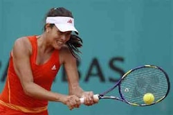 Ana Ivanovic, Date Krumm out amid the Paris showers