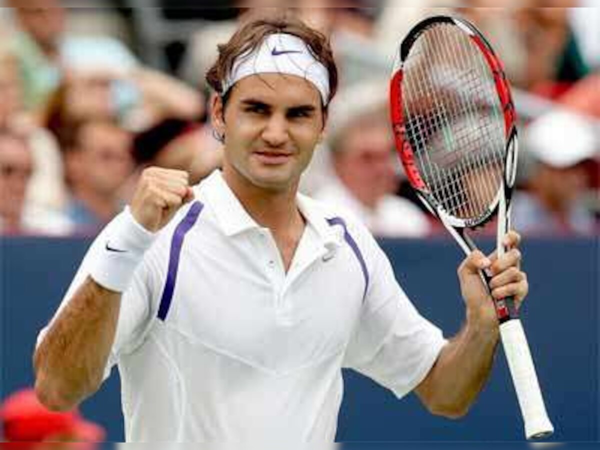 Roger Federer bursts into life to beat Philipp Kohlschreiber