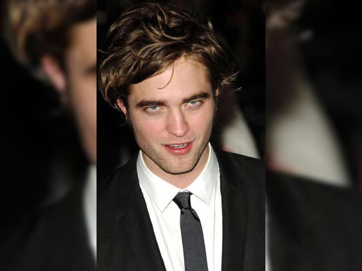 Robert Pattinson admits fans help him check his schedule