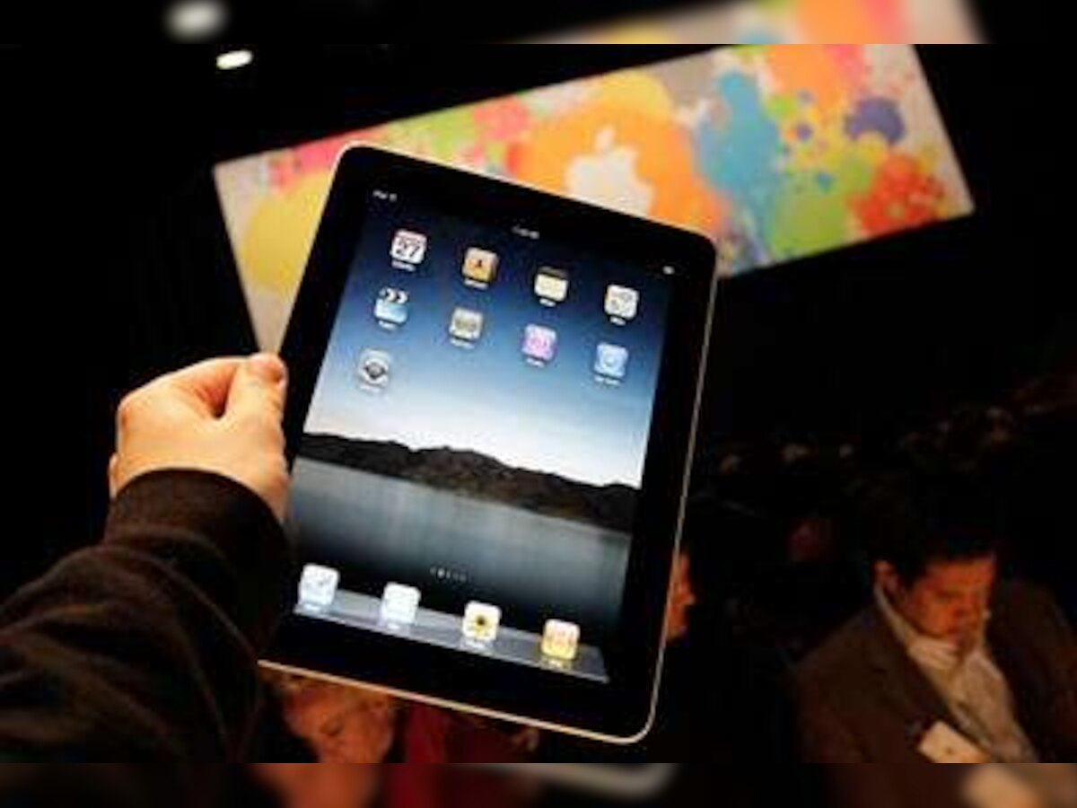 Apple says iPad sales hit 3 million, shares climb