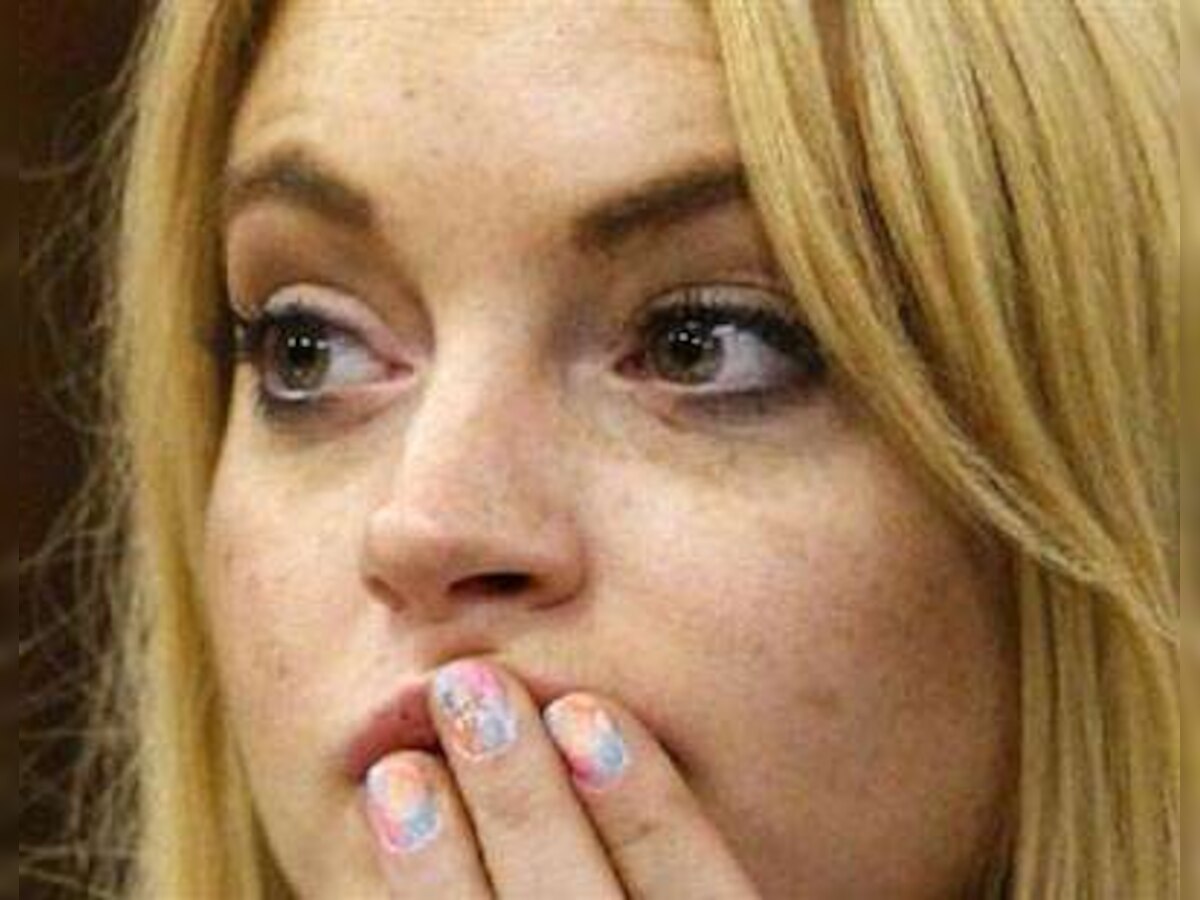 Lindsay Lohan's lawyer says jail time "unfair", then quits