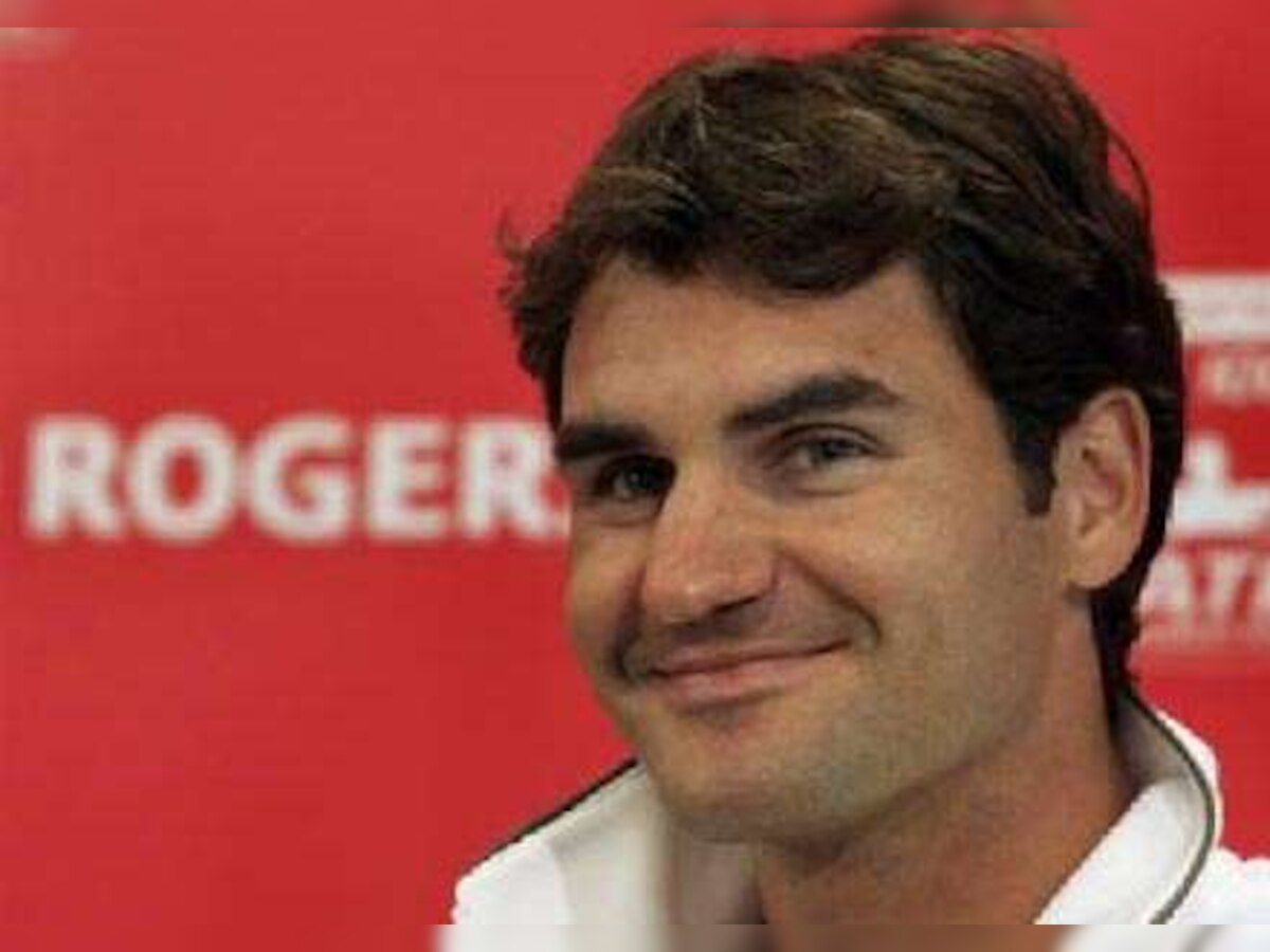 Roger Federer takes new coach for test drive at Toronto Masters