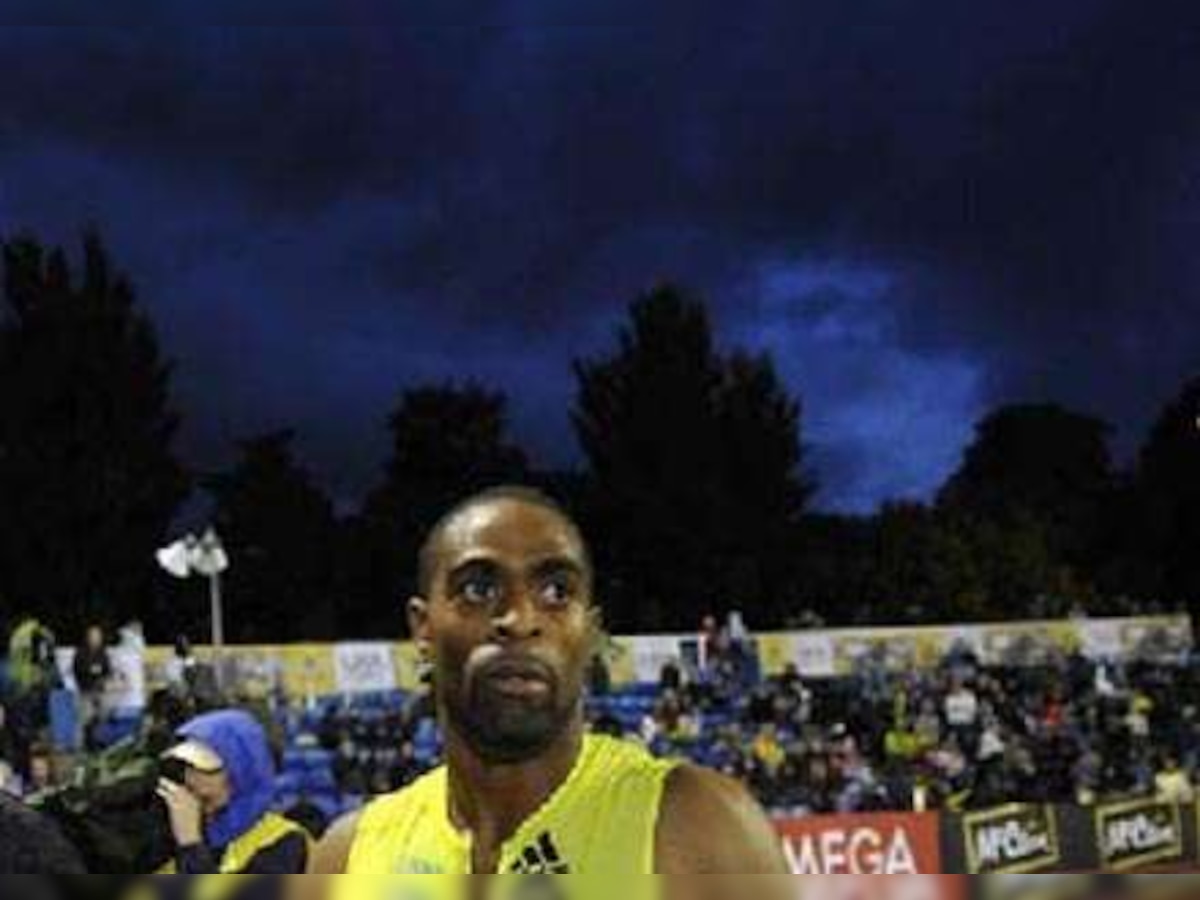 Tyson Gay defies the elements to blast season's-best win