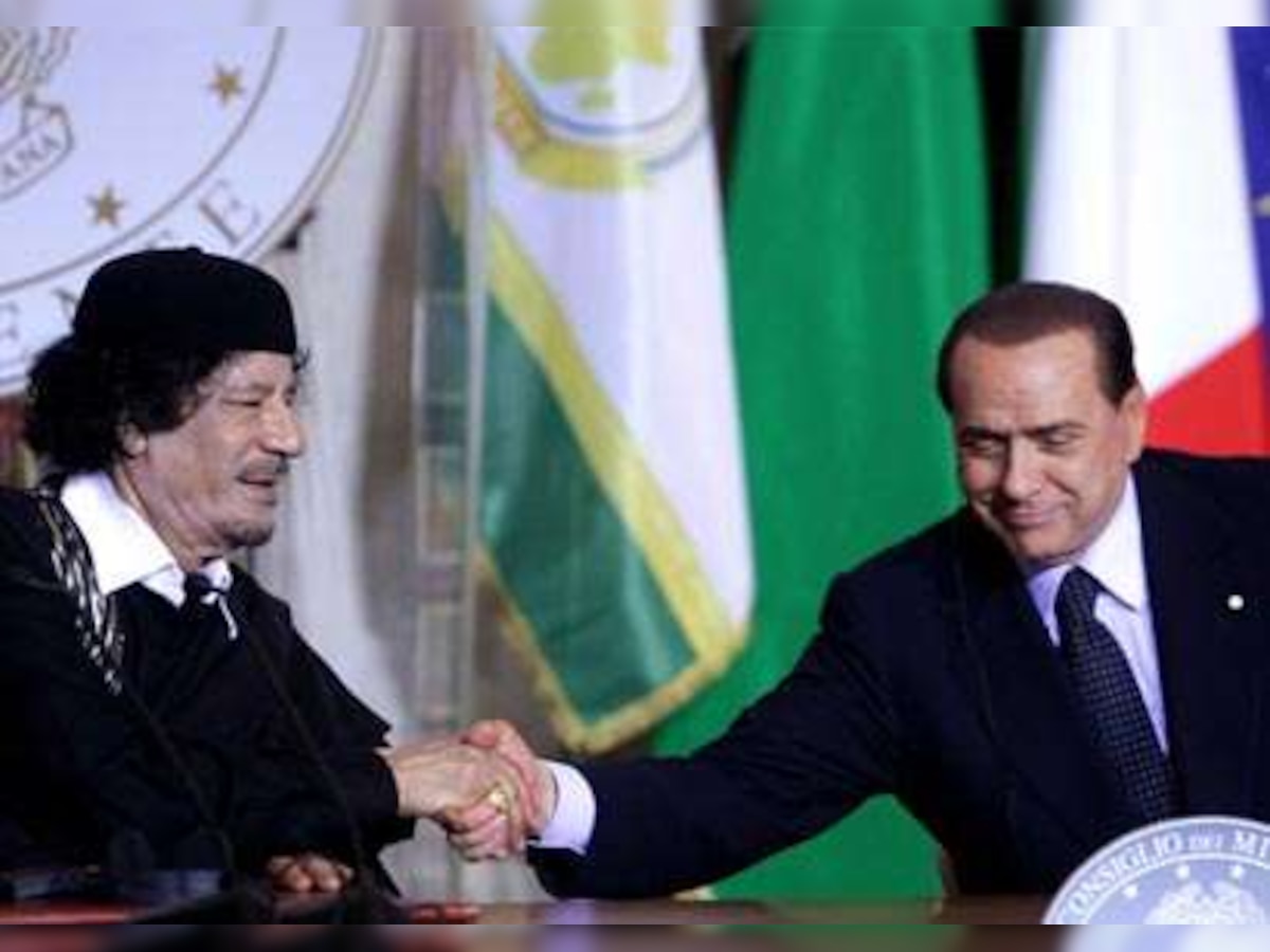 Libya's Muammar Gaddafi causes upset on Italy visit