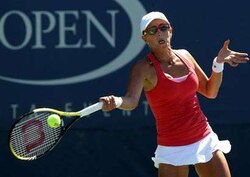 Samantha Stosur battles way into US Open second round