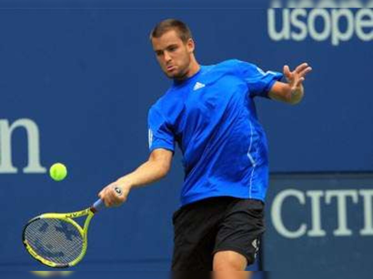 Mikhail Youzhny wears down Stanislas Wawrinka; into semi-finals