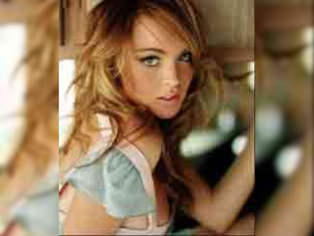 Lindsay Lohan's probation revoked, arrest warrant issued over failed drug tests