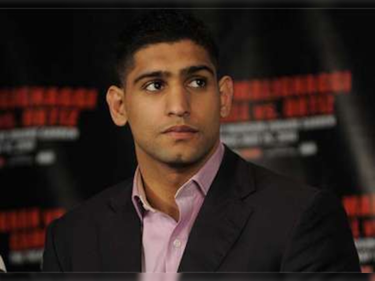 Boxer Amir Khan lashes out at cheating footballers