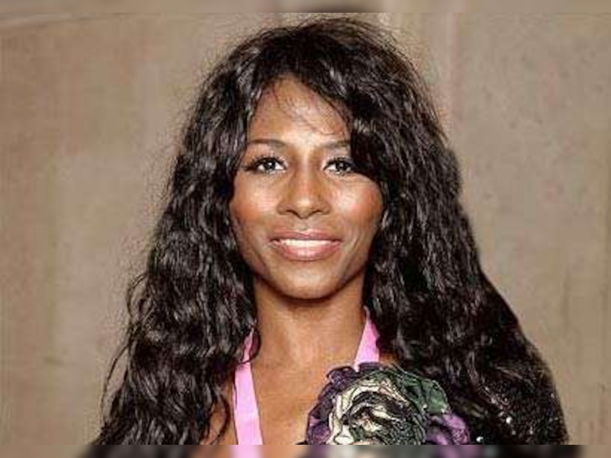 Sinitta goes nude for shoot on back of chair 