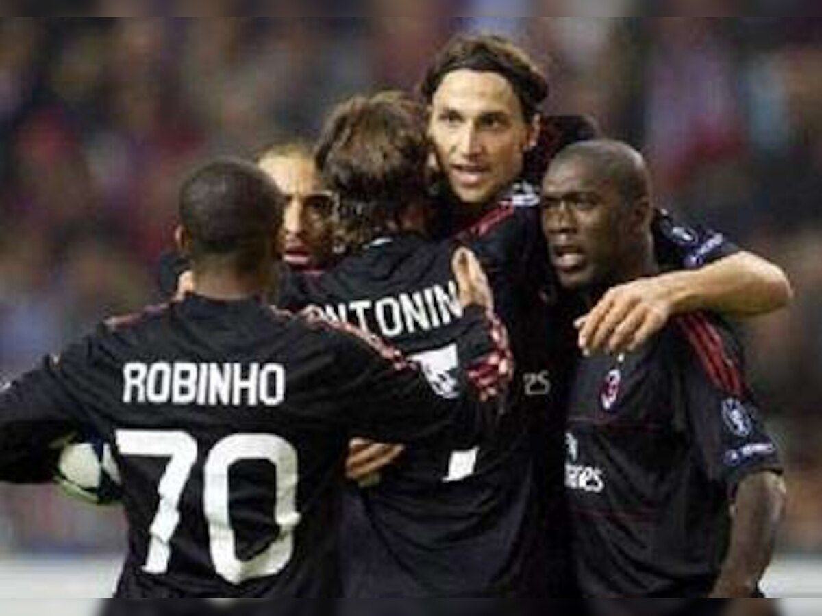 Champions League: Angel provides divine inspiration; Milan held