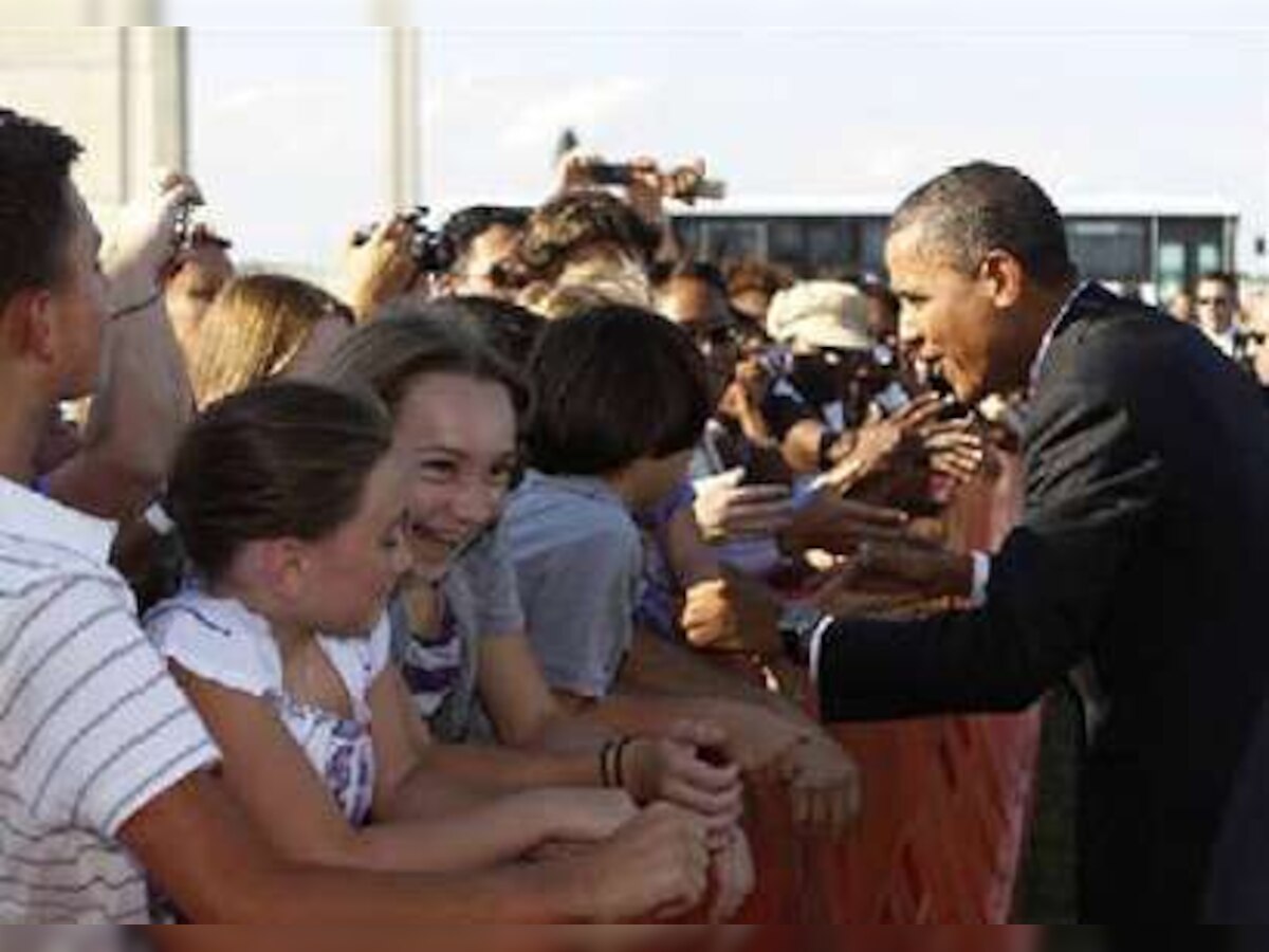 Obama touts job creation as midterm elections near