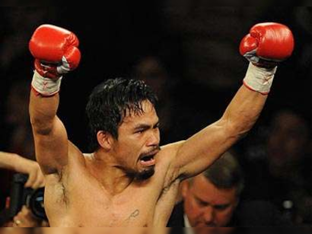 Manny Pacquiao beats Antonio Margarito to land super welterweight title