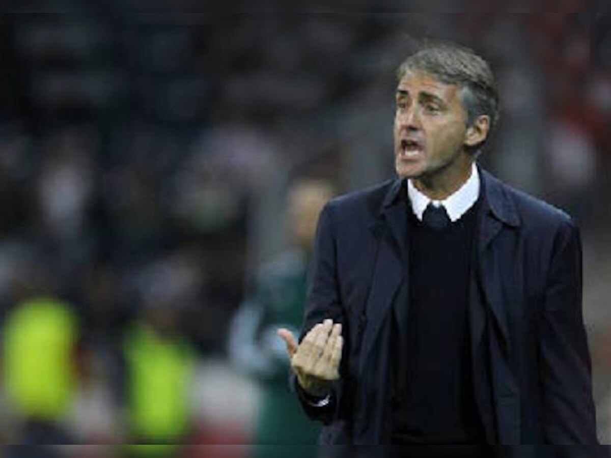 Mark Hughes accuses Roberto Mancini of secretly stealing his job at Manchester City