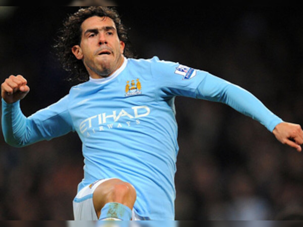 Roberto Mancini to persuade Carlos Tevez to stay on at Manchester City