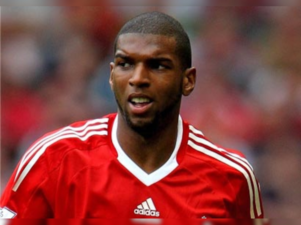 Liverpool's Ryan Babel charged for mocking referee Howard Webb on Twitter