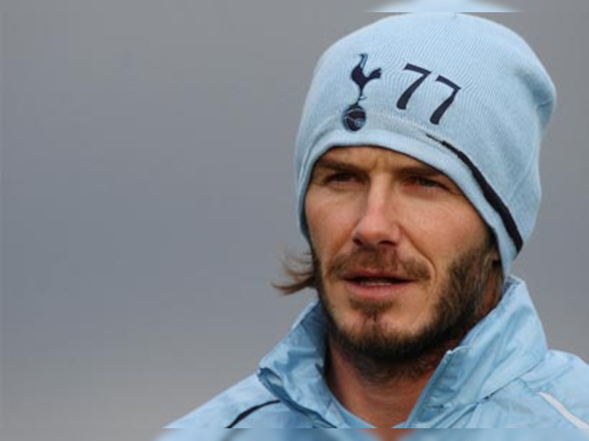 David Beckham trains with Tottenham but no news on loan deal