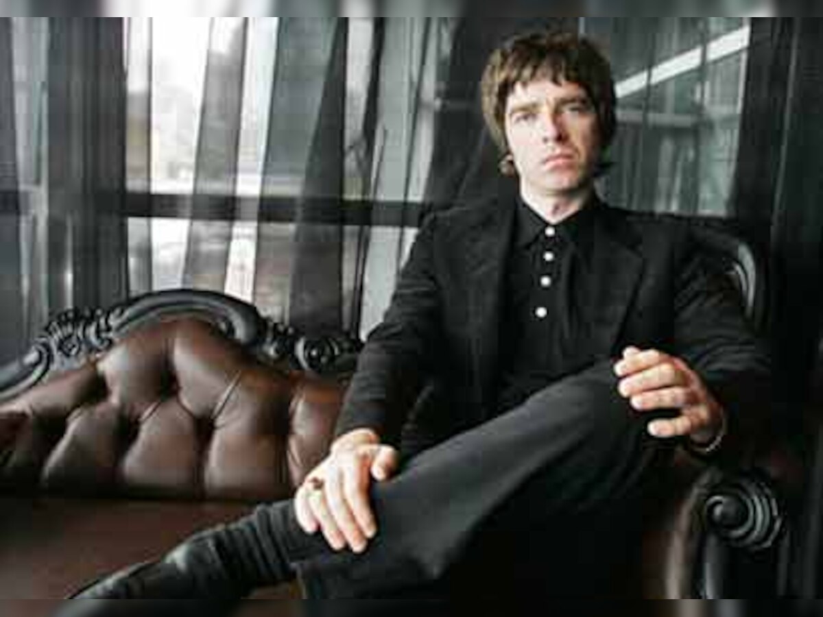 Noel Gallagher donates 'Roll With It' platinum disc 