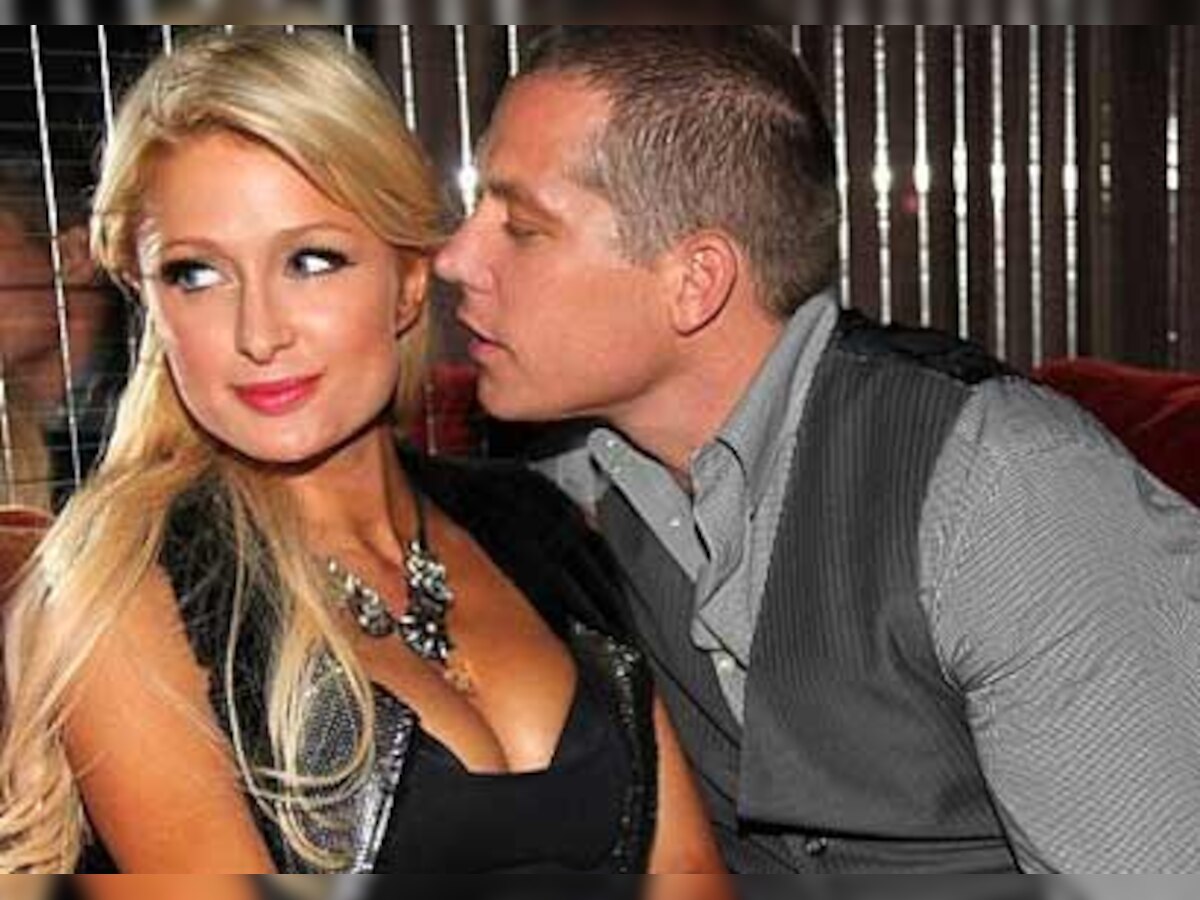 Paris Hilton, Cy Waits can't keep their hands off each other