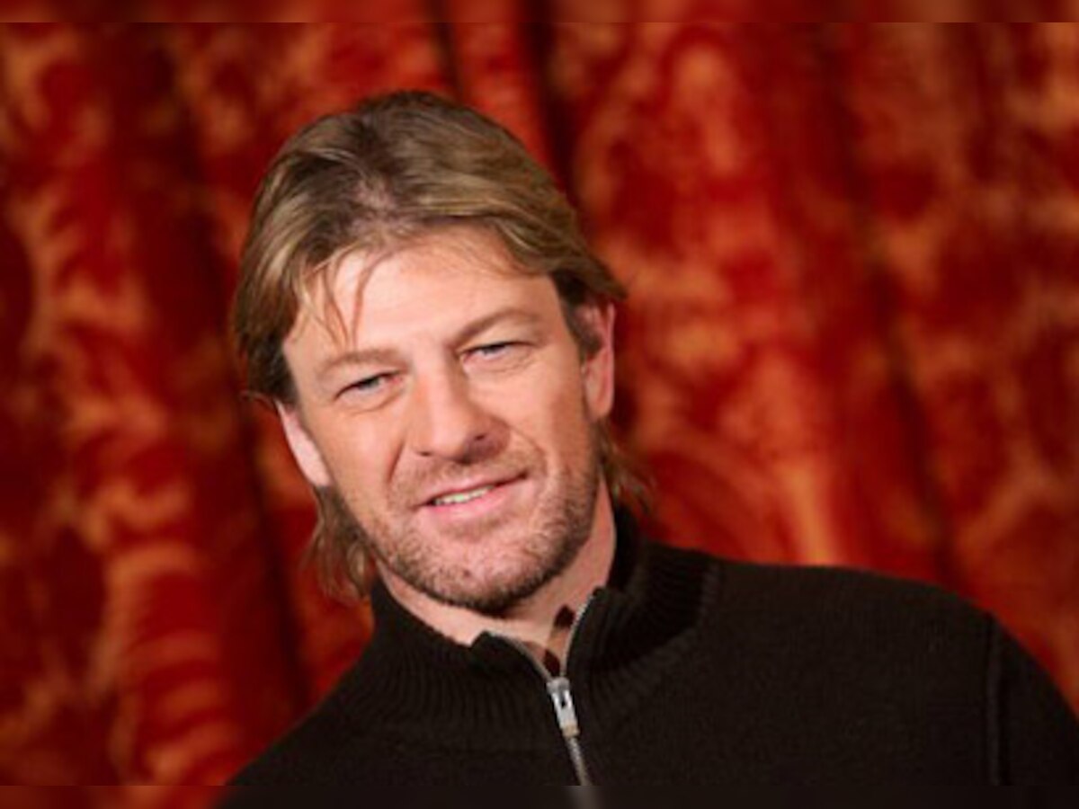 Sean Bean stabbed after row over topless-model lover