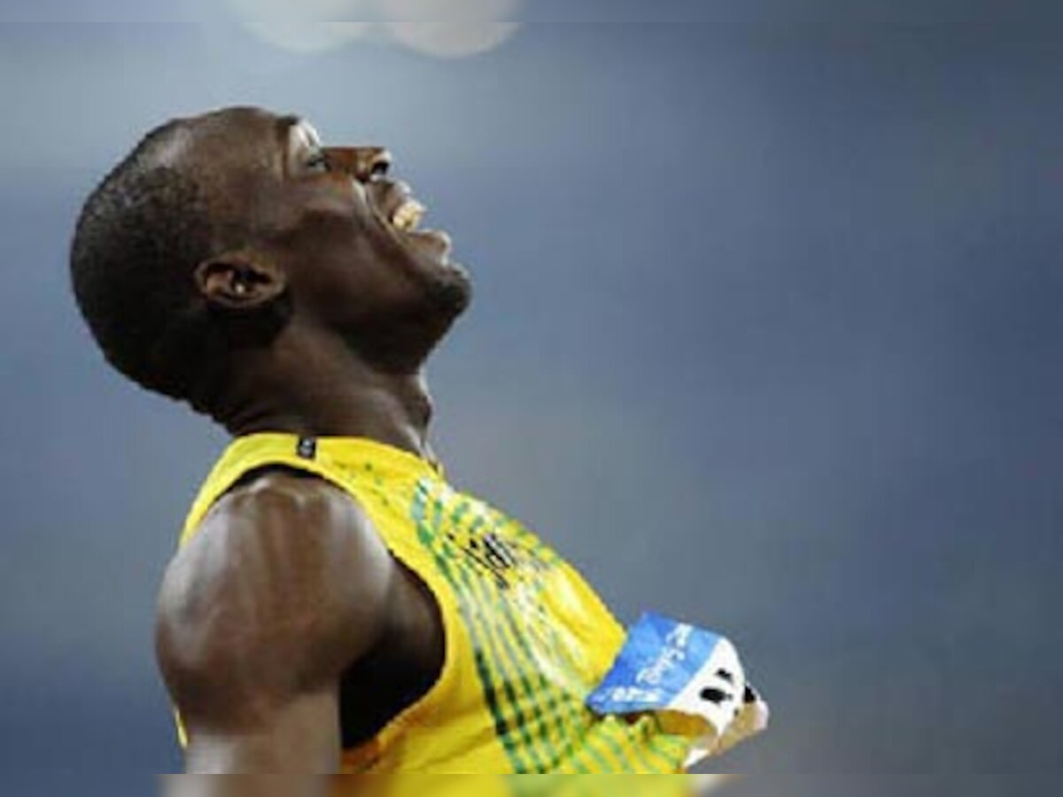 World championships: Brilliant Bolt cruises into 200 final