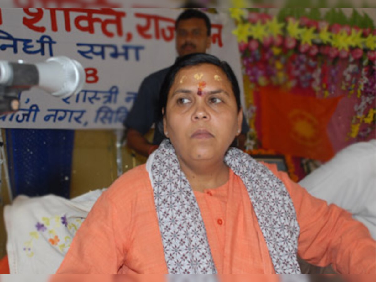 Will set Wal-Mart on fire, threatens Uma Bharti