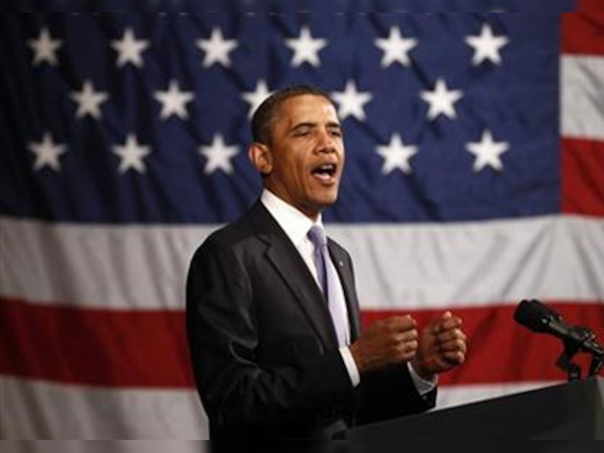 Obama hits Republicans, Wall St in populist speech