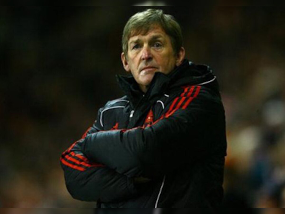 Kenny Dalglish defends policy as Andy Carroll escapes fine