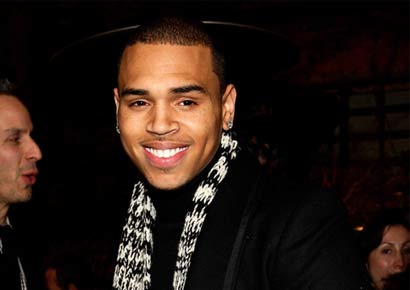 Chris Brown hints he will sue R&B singer Raz B