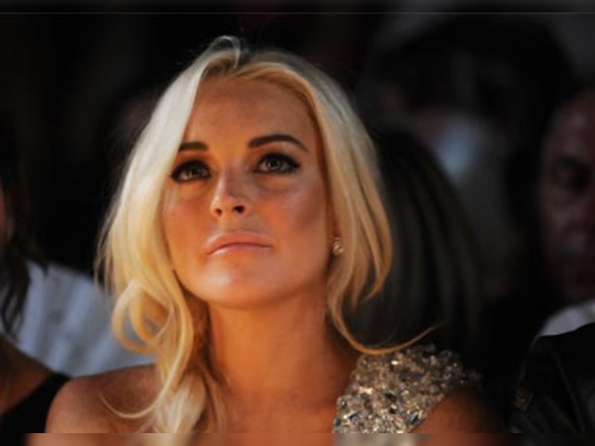 Slash defends Lindsay Lohan following her latest arrest
