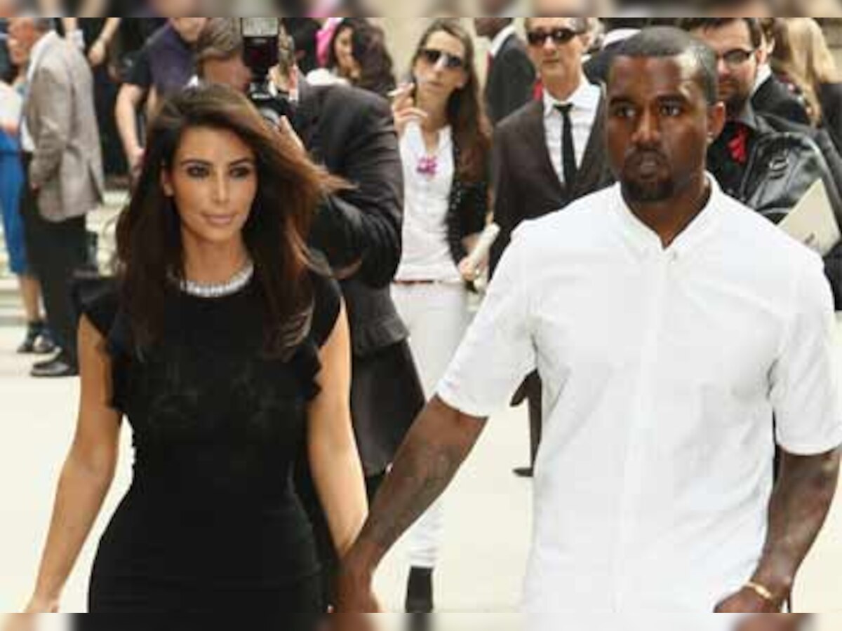 Kim Kardashian trying to prove she will be a prefect wife