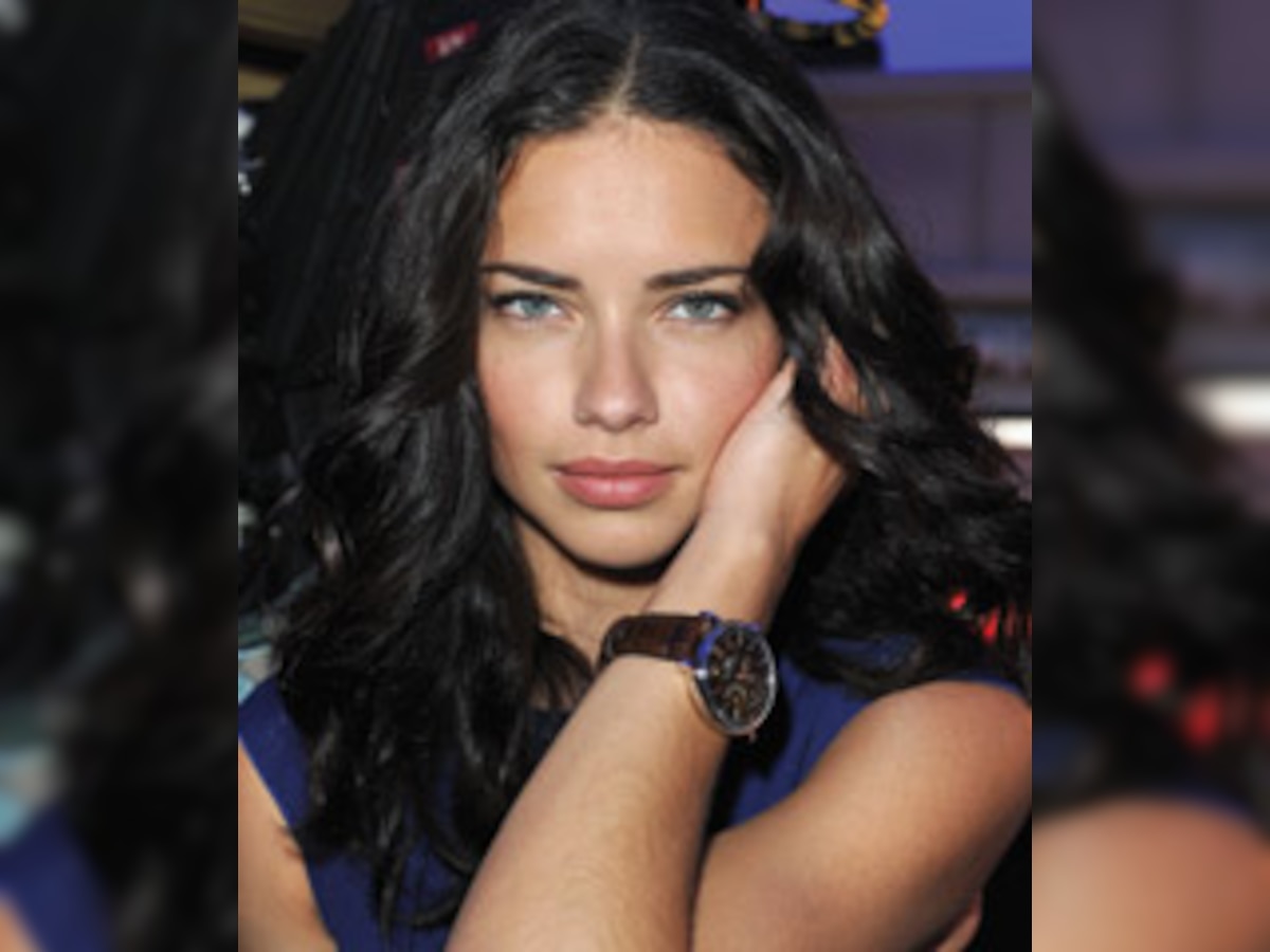 Adriana Lima sets record by posing pregnant for 'Pirelli Calendar'