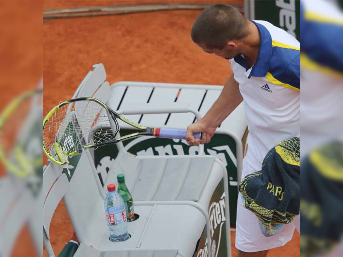 Angry Mikhail Youzhny spares own head as racket takes the hit at French Open