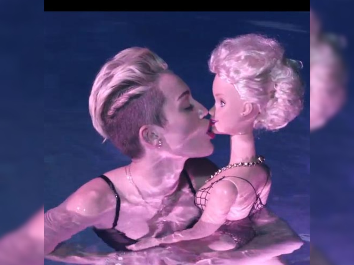 Miley Cyrus makes out with Barbie in new music video