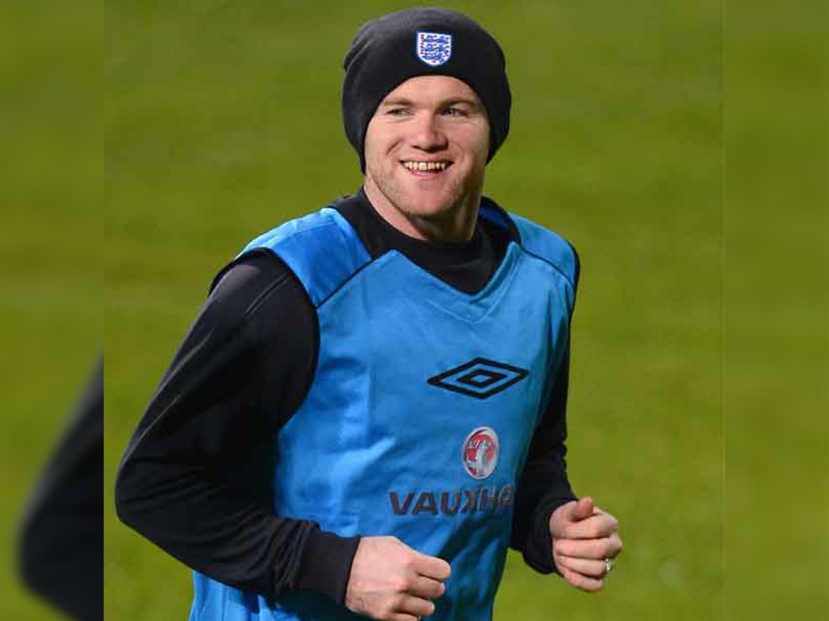 Wayne Rooney trains with England, expected to feature