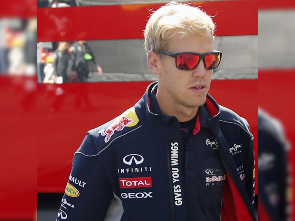 Sebastian Vettel shows off new blond look at Belgium GP as F1 returns after a break