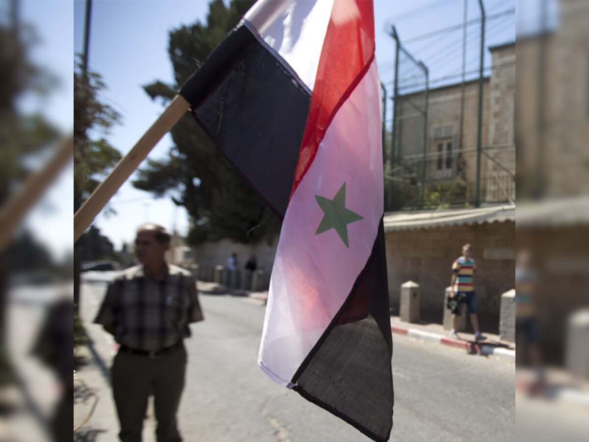 Israeli minister cautiously welcomes Syria chemical arms plan