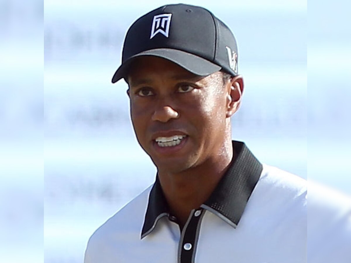 Happier Tiger Woods back in contention for BMW Championship after rules violation