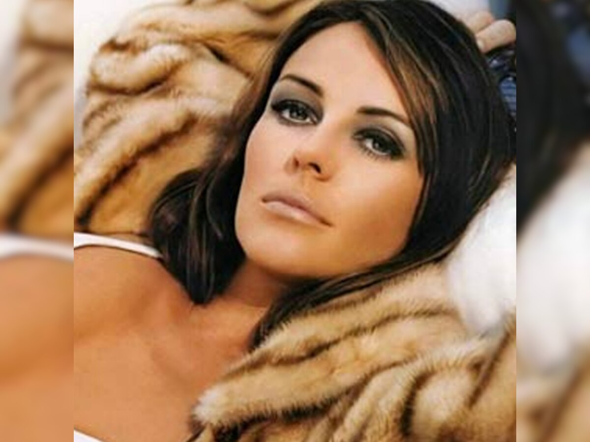 Liz Hurley says 'break-up' with Shane Warne 'too raw and personal to share'