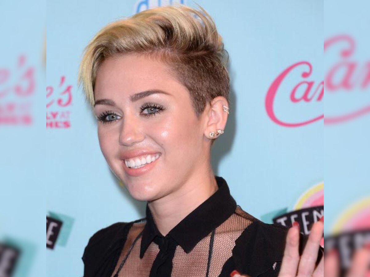 Miley Cyrus' father Billy Ray Cyrus calls her VMA act as 'reinventing her sound'