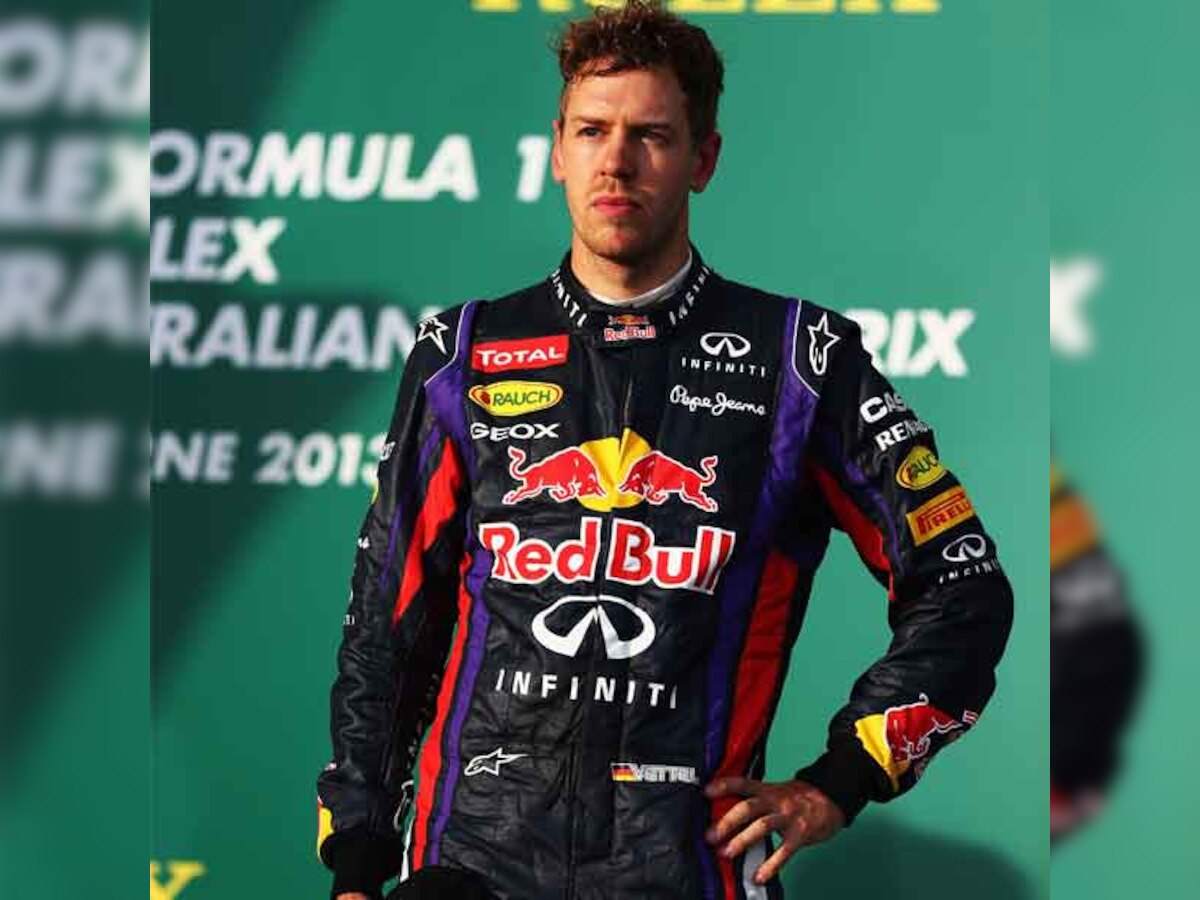 Sebastian Vettel storms to pole position in Singapore